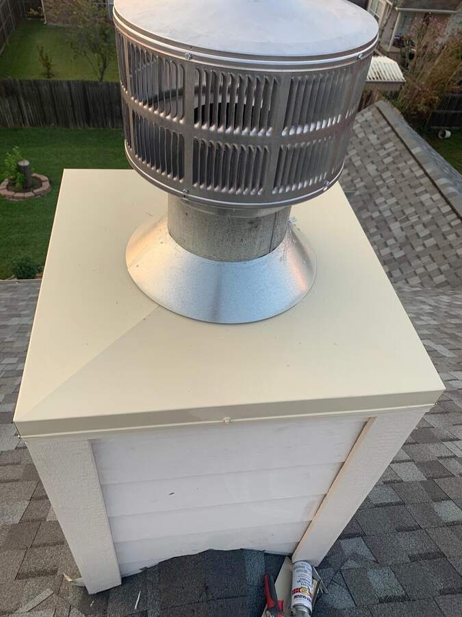 Chimney chase with new stainless cap
