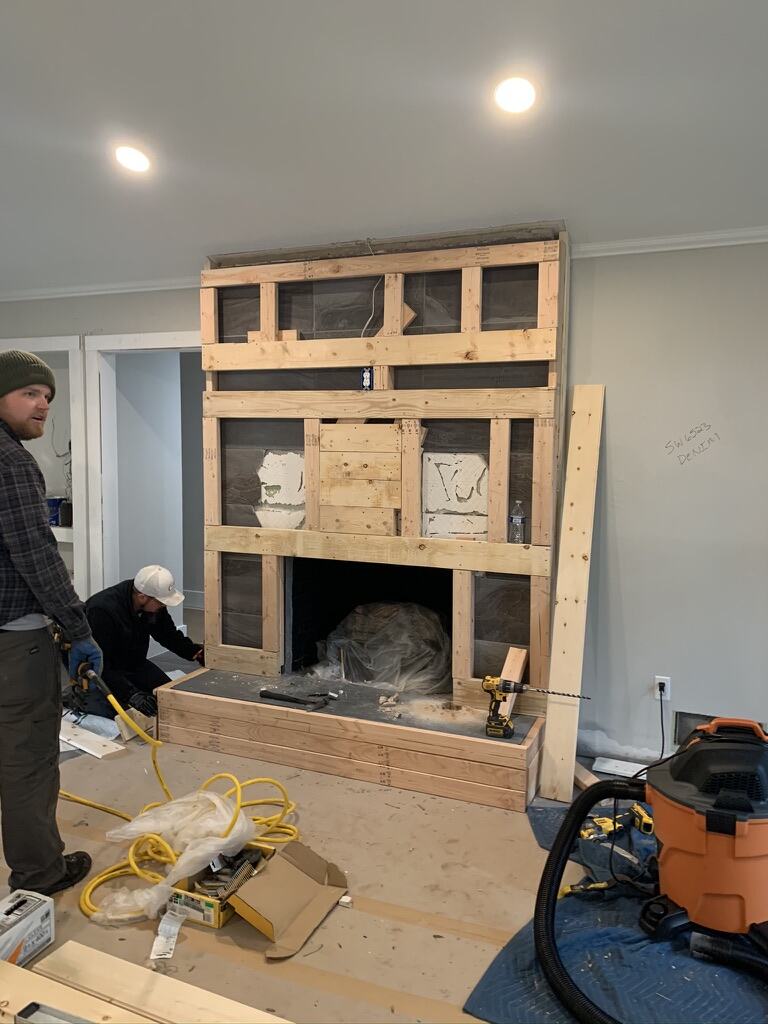 Before: fireplace surround framed in new lumber during construction